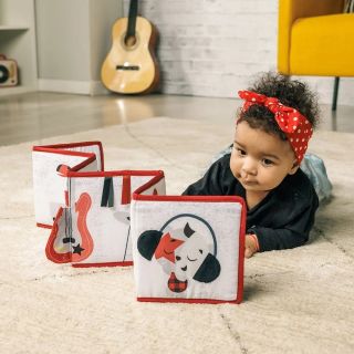 TINY LOVE  Мека двулицева текстилна книжка-обиколник Double-sided First Book от серията Tiny Rockers, 0м+